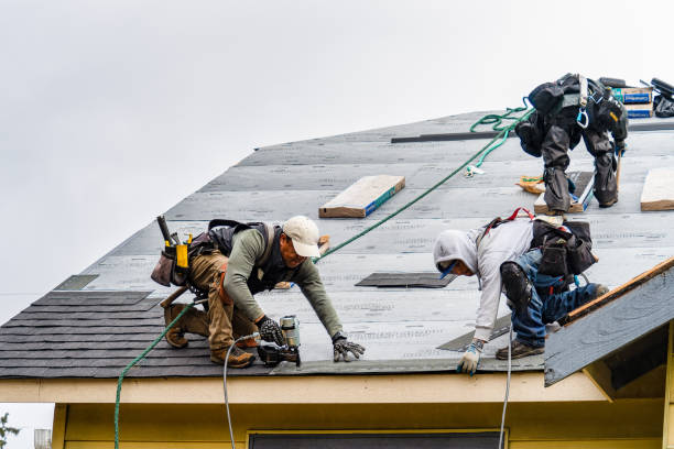 Professional Gutter Installation technician working in Iowa Falls, IA